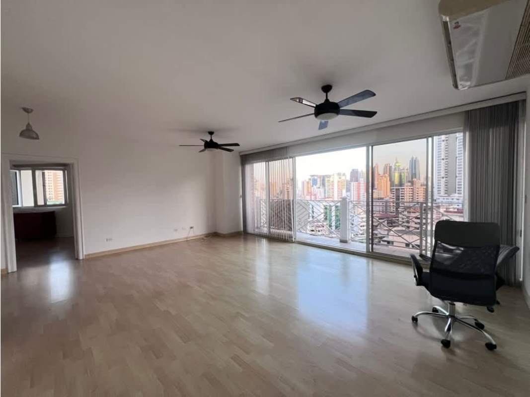 Spacious dining area with wood floors and large windows in PH VistaNova El Cangrejo Panama