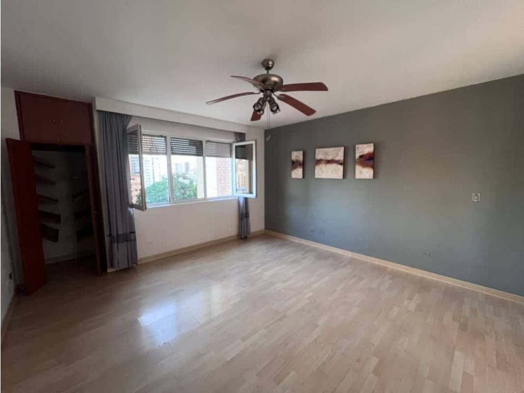 Modern kitchen with granite countertop and full appliances in PH VistaNova Panama City