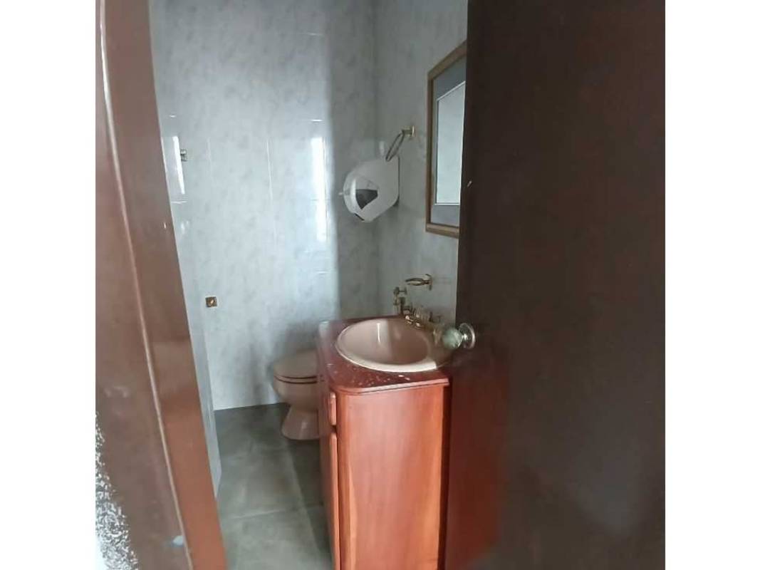 Partitioned private office area with window and ceramic flooring in San Francisco Panama