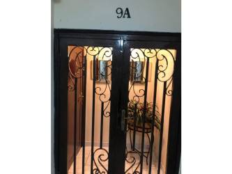 Secondary bedroom with large window and built-in closet in PH Aranjuez Panama City