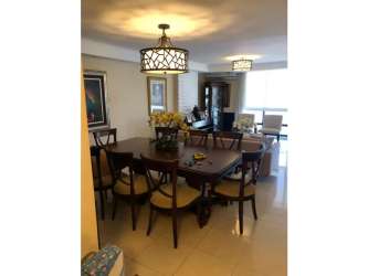 Kitchen featuring wood cabinets and granite countertops in PH Aranjuez El Cangrejo Panama City