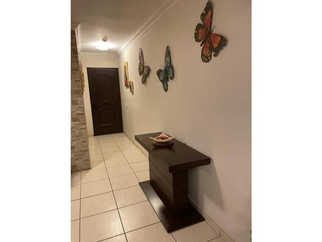 Interior hallway with modern decor leading to bedrooms PH Coco Mar