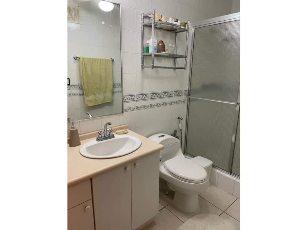 Dining space next to living room with ocean views in PH Coco Mar, Panama City