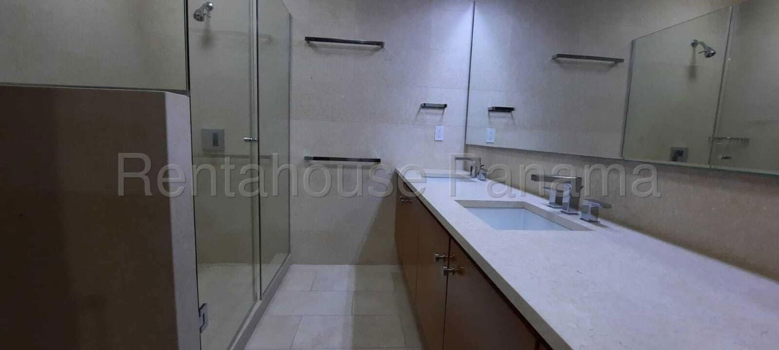 Modern marble bathroom with glass shower enclosure and premium fixtures in PH Greenview Panama City