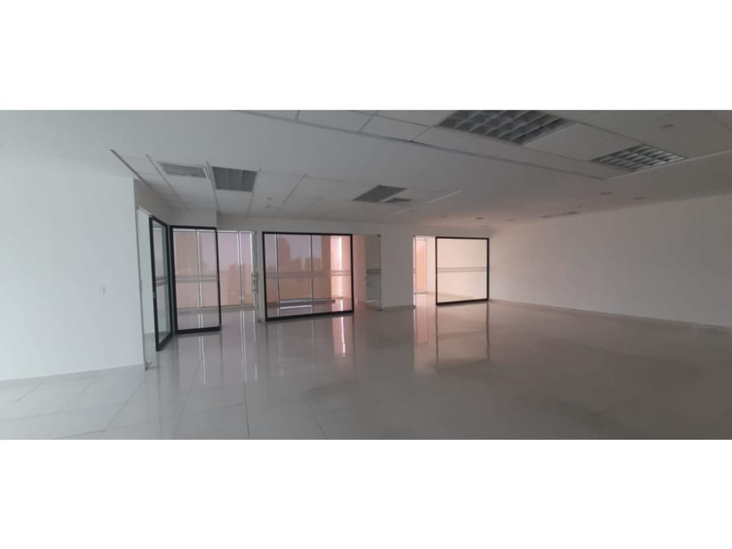 Spacious office interior with floor-to-ceiling glass partitions overlooking the city in Torre Global Bank, Banking District Panama