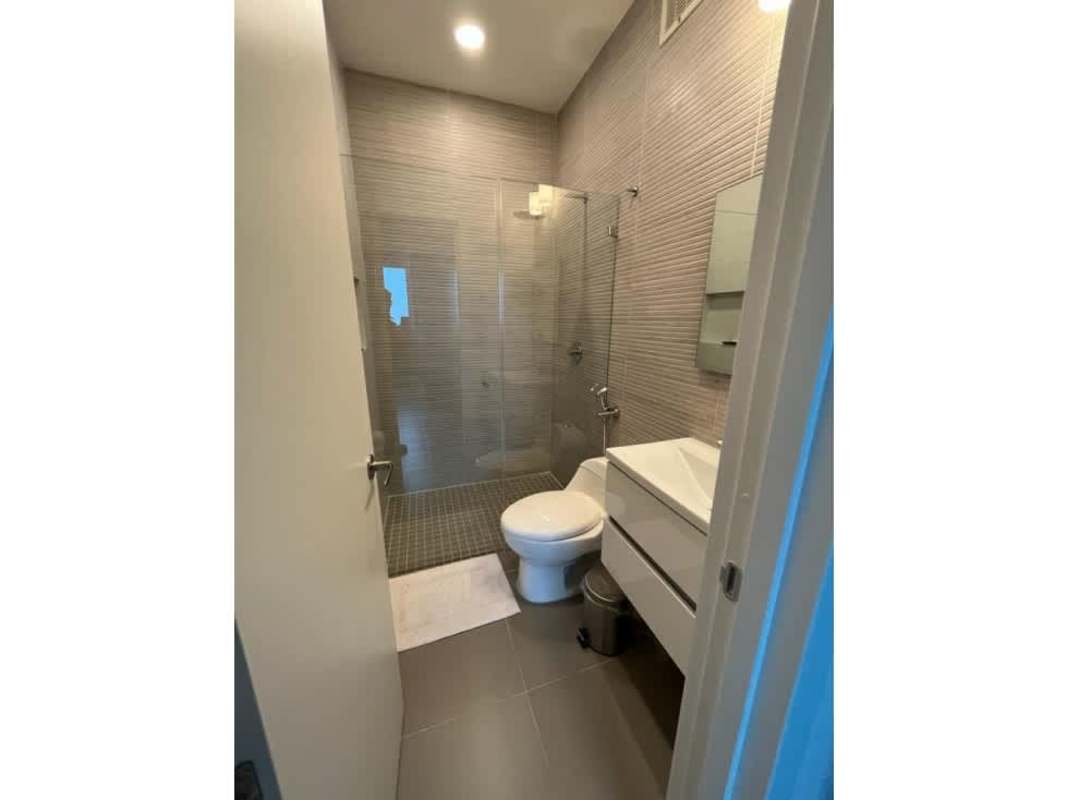 Bright bedroom with skyline panorama, large window in Altamira Residences Bella Vista Panama City