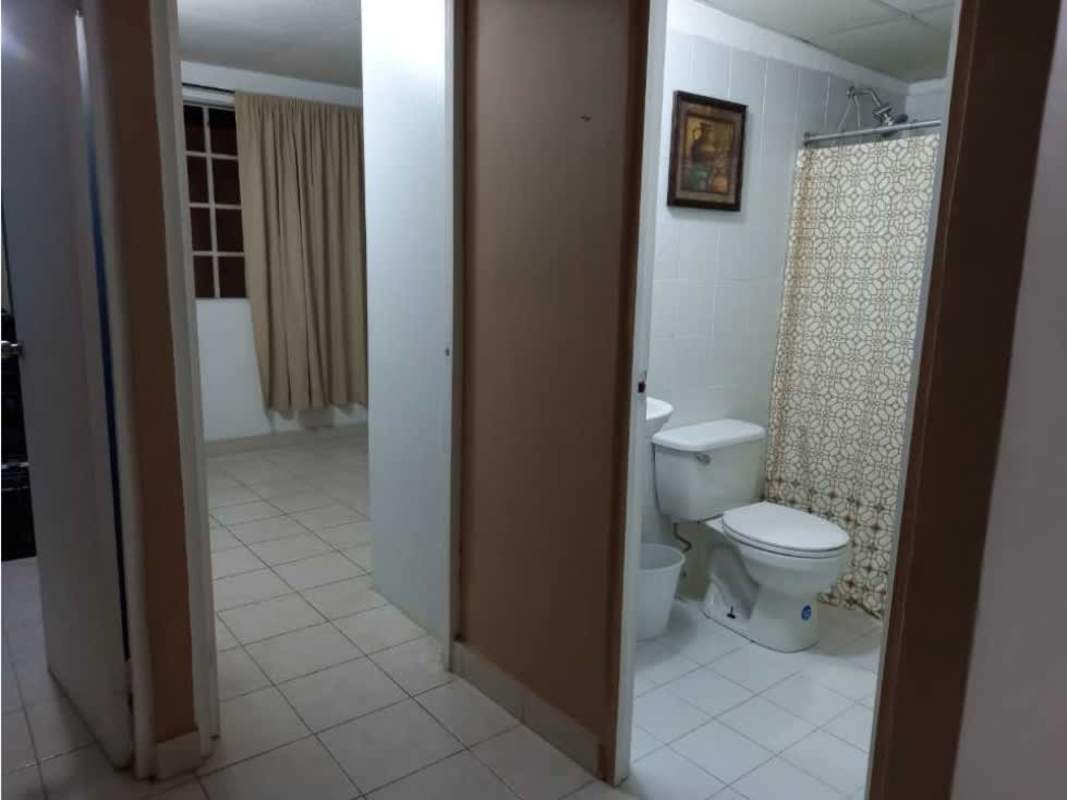 Upstairs master bedroom with ceramic tile floors and windows in La Alameda de Las Cumbres Panama