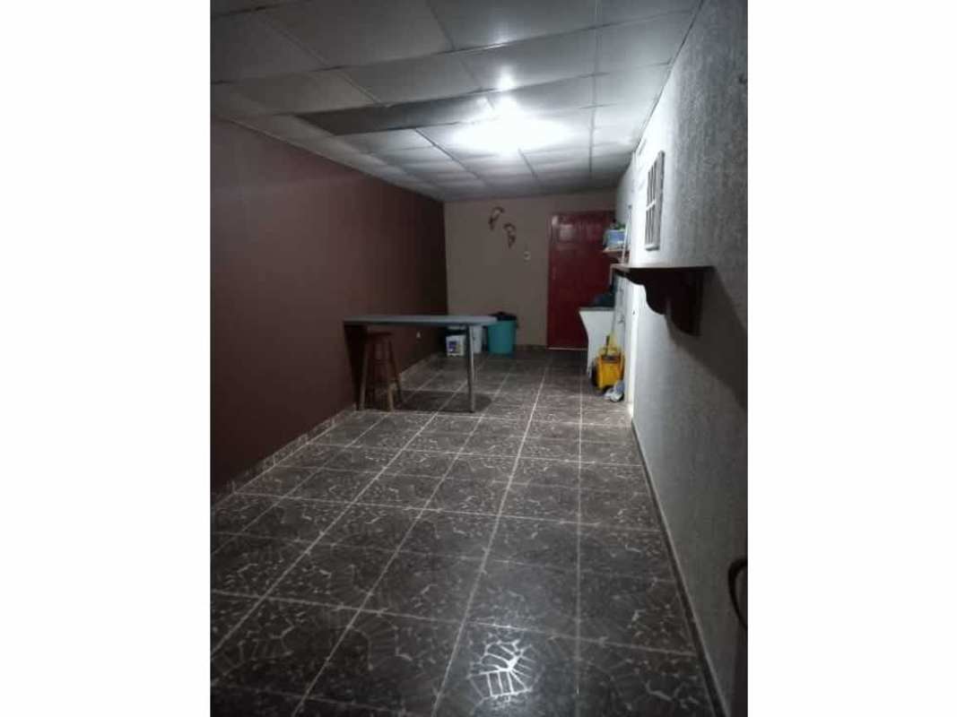 Two-story family house exterior facade with parking in La Alameda de Las Cumbres, Chilibre Panama