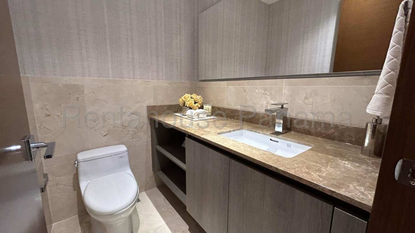 Modern bathroom marble countertops, glass shower condo at The Reserve Santa Maria Panama