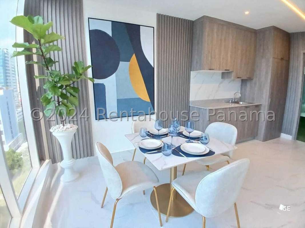 Bright studio bedroom with floor-to-ceiling corner windows city view PH Amazonas Panama