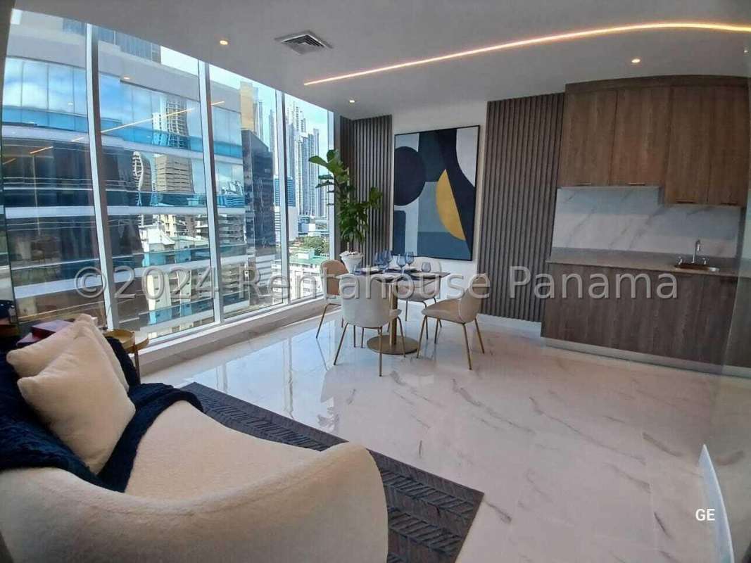 Contemporary studio dining area with kitchenette and large window PH Amazonas Panama