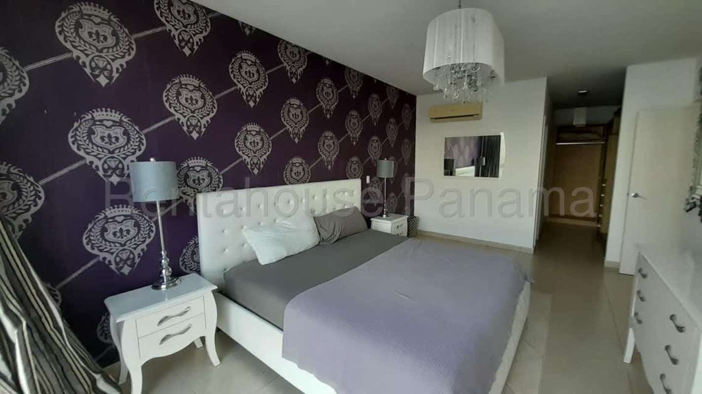 Spacious bedroom with floor-to-ceiling windows and ocean views in PH BICSA Financial Center Panama