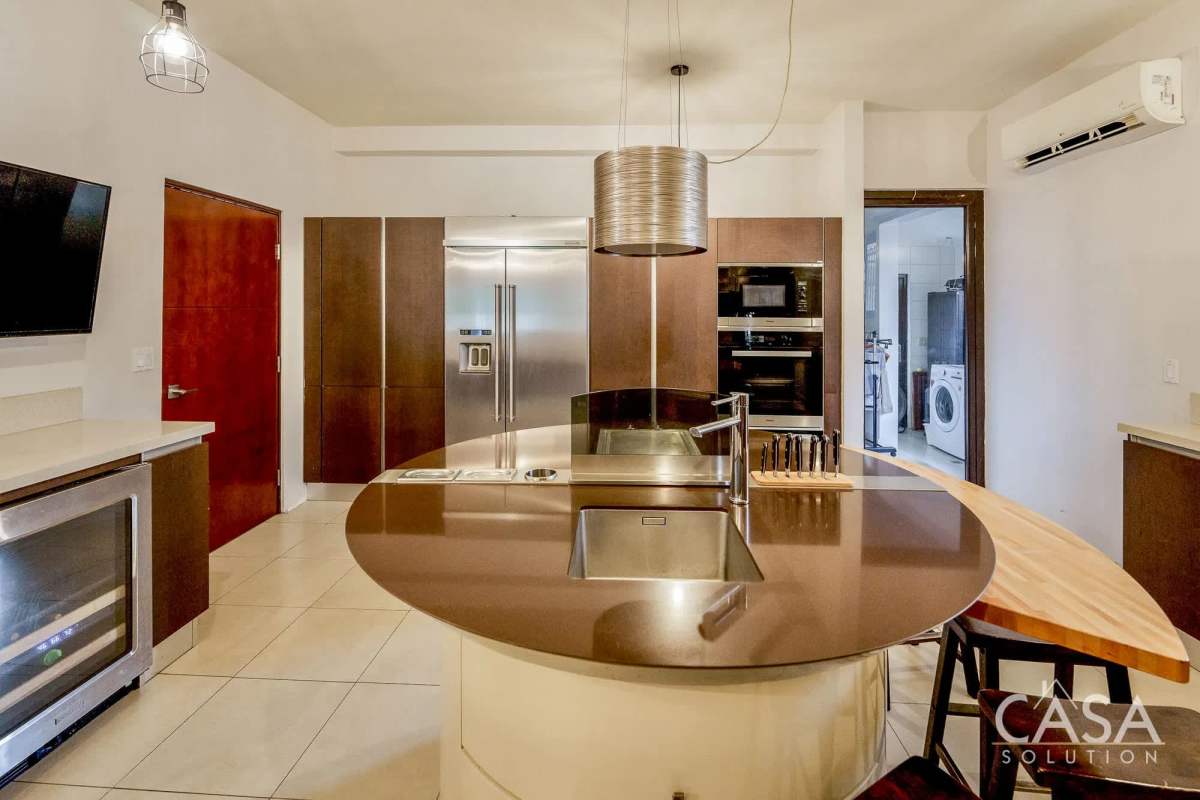 Luxury bathroom with freestanding tub, glass shower and large vanity in Embassy Club home Panama