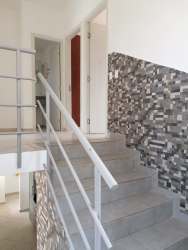 Modern two-story yellow white facade balcony garage Santillana Nuevo Arraiján