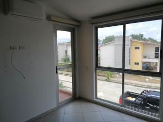 Room with large windows tiled floors air conditioning Santillana Nuevo Arraiján Panama