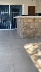 Stone countertop outdoor bar patio area in PH Palmeras del Golf Coronado