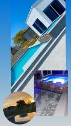 Bright blue swimming pool with hot tub and garden view at beach house in Coronado Panama