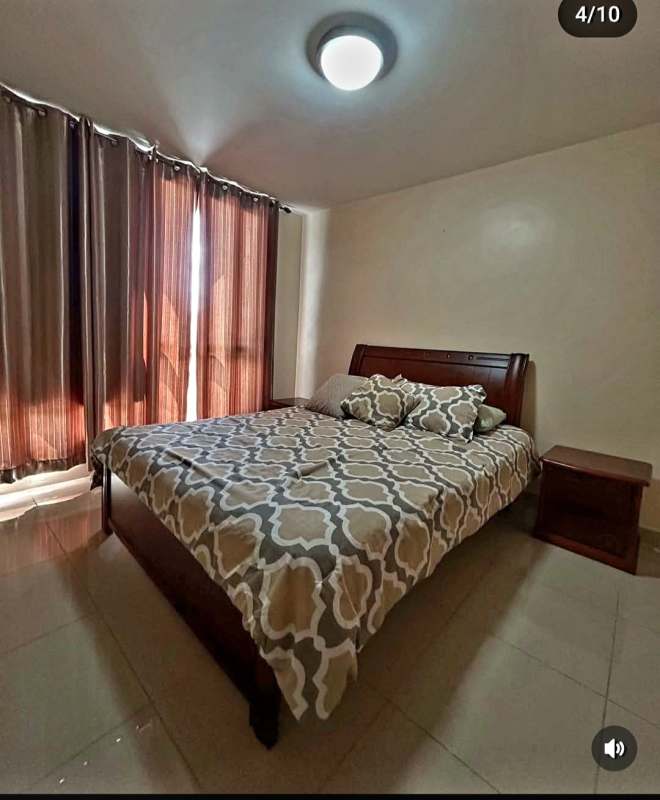 Modern gym with weights and mirrors in PH Rokas condominiums Condado del Rey Panama