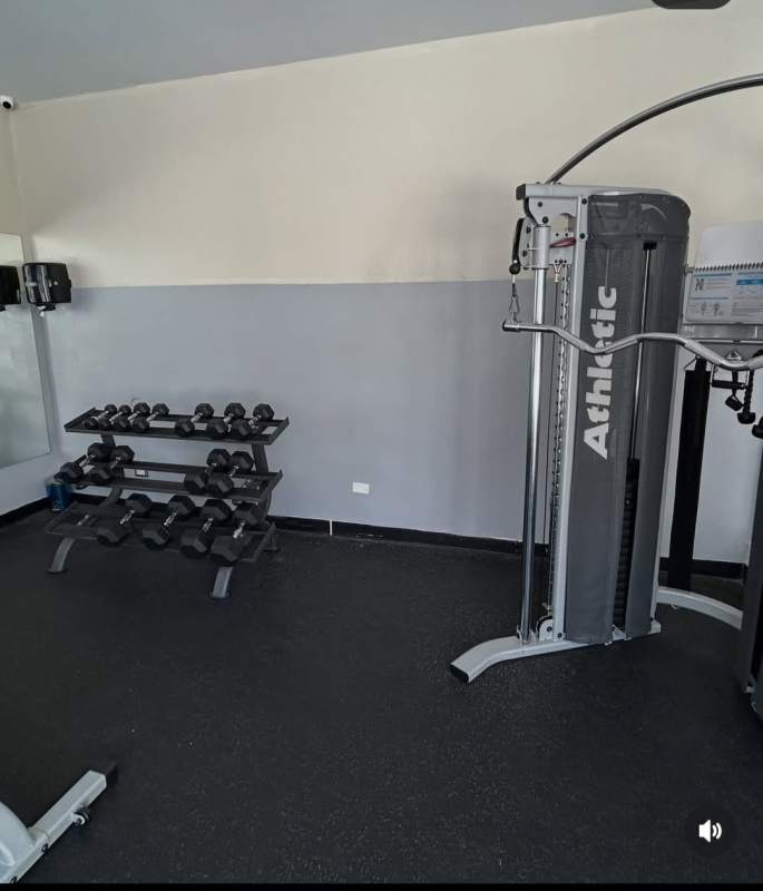 Swimming pool area surrounded by high-rise towers PH Rokas Condado del Rey Panama