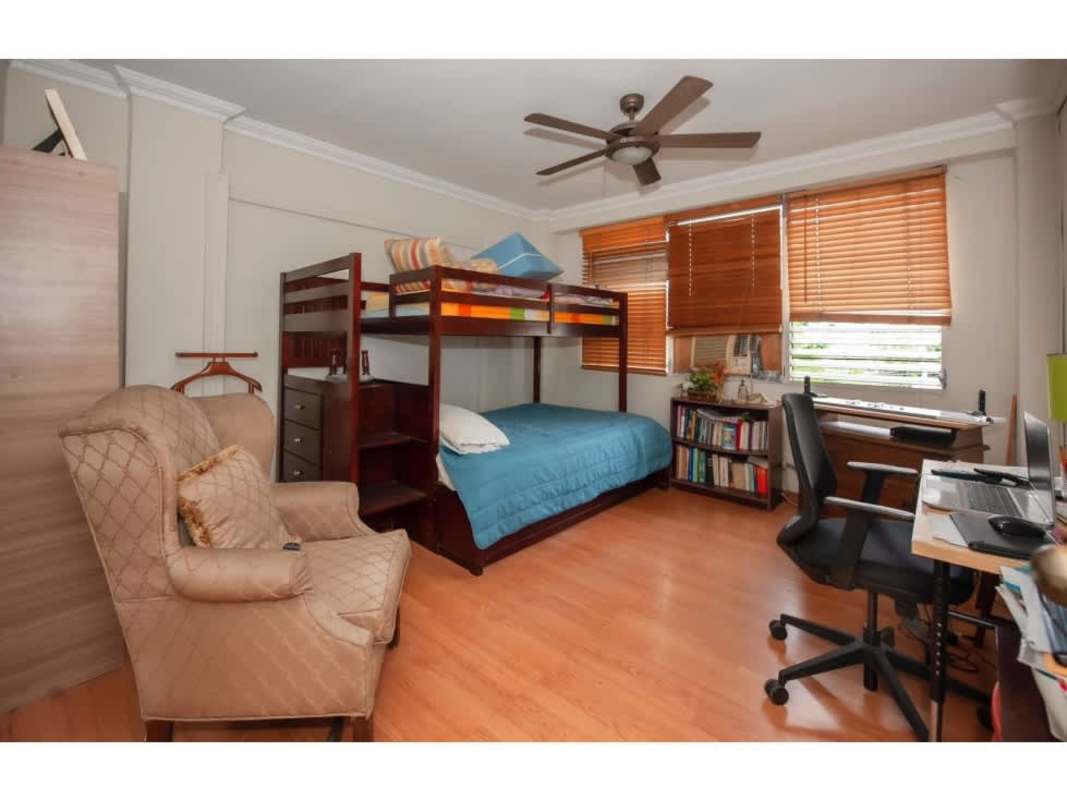 Dining room with traditional furniture, large window and tiled floors at PH Continental Tower El Cangrejo Panama City