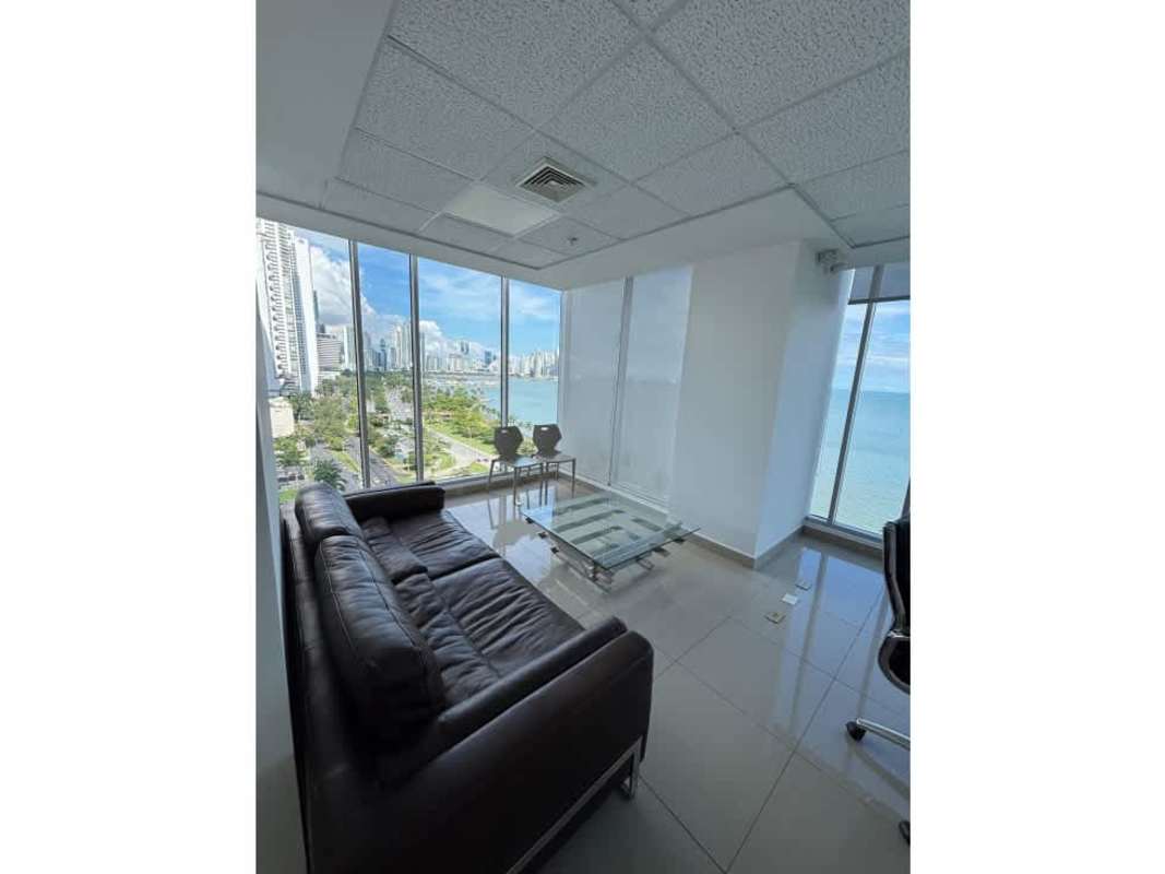 Floor-to-ceiling glass corner executive office with Pacific ocean and city views in Balboa Office Center Panama City