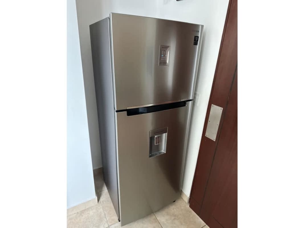 Laundry zone features washer, dryer, and gas heater at PH Marquis Tower El Cangrejo