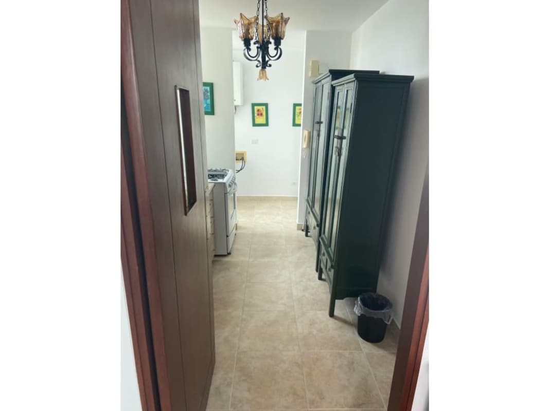 Living room with city views, sliding glass door to balcony at PH Marquis Tower El Cangrejo Panama City