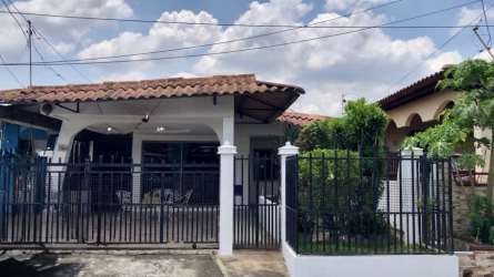 Covered patio area with outdoor seating and tile floors at Vacamonte residence Panama Oeste