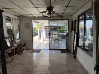 Enclosed porch with glass doors and windows in house located in Vacamonte, Panama Oeste