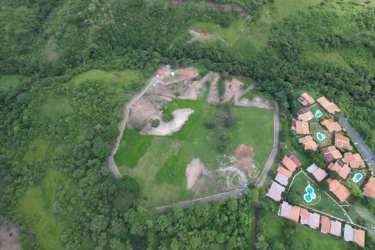 Aerial showing fenced subdivisions and greenery at Montevita residential community in Panama