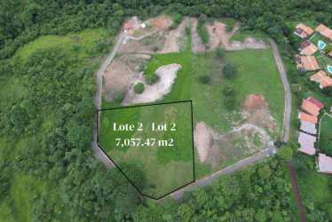 Hillside view of undeveloped land with green mountains and blue sky Las Lajas Panama