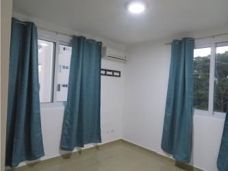 Bathroom featuring mosaic framed mirror, modern fixtures in PH Urbis Tower Panama rental apartment