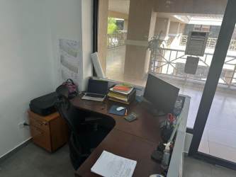 Commercial office interior with daylight and glass door Costa Verde Plaza La Chorrera
