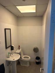 Glass entrance and signage above balcony of office at Boulevard Costa Verde La Chorrera Panama