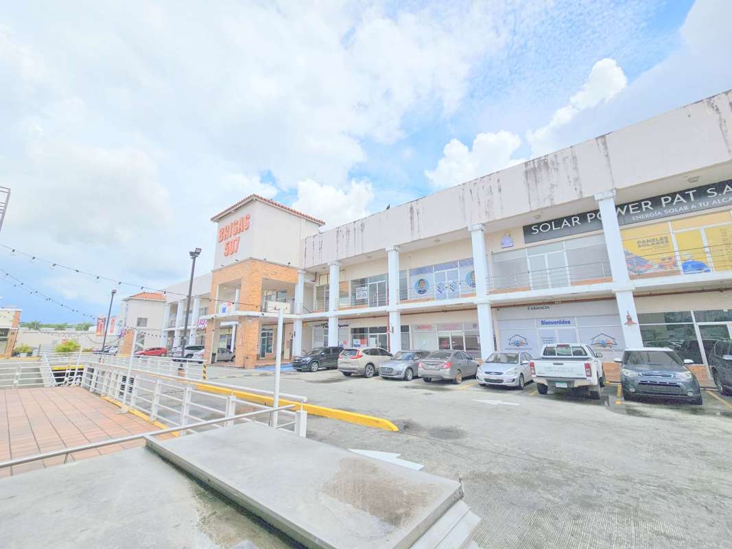 Two-story commercial plaza exterior with parking Plaza Brisas 507 Brisas del Golf Panama City