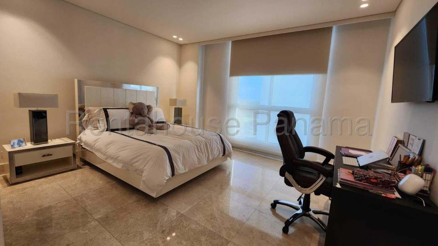 Luxury outdoor pool with deck, sun loungers in Santa Maria Golf community Panama