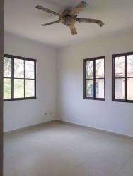 Bathroom with granite vanity walk-in shower and modern fixtures in Hacienda Pacifica