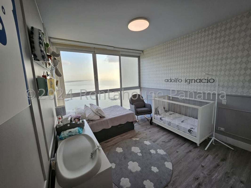 Open dining area connected to living room featuring oceanfront views in Punta Pacifica