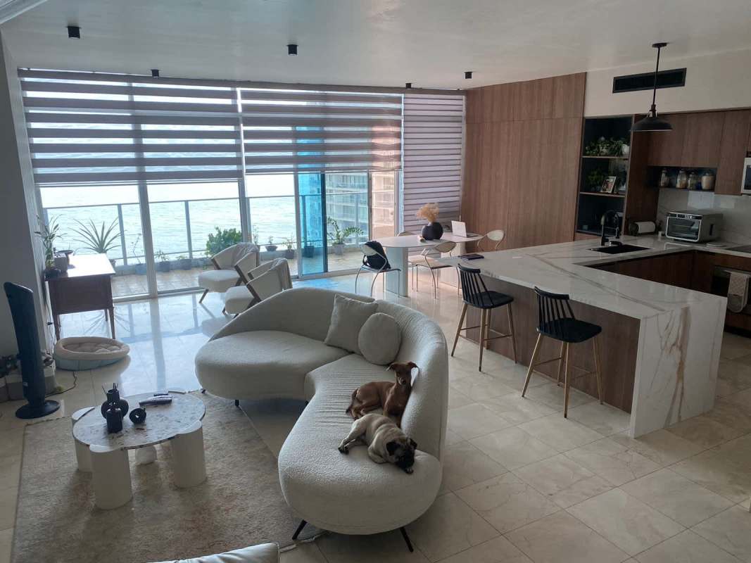 Spacious bedroom with marble floor and ocean view window in PH Pacific Village Punta Pacifica Panama