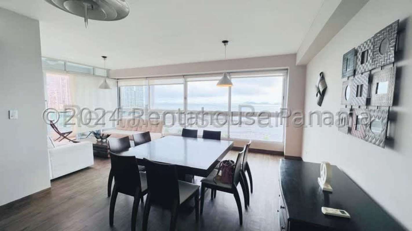 Apartment living and dining space with ocean views PH Bayfront Panama City