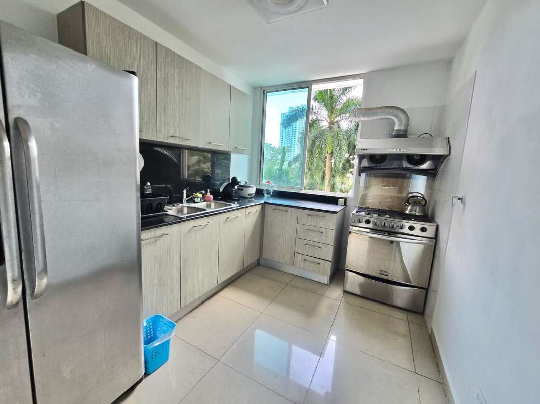 Modern kitchen with appliances and cabinetry in PH Green Park Tower 600 Condado del Rey Panama