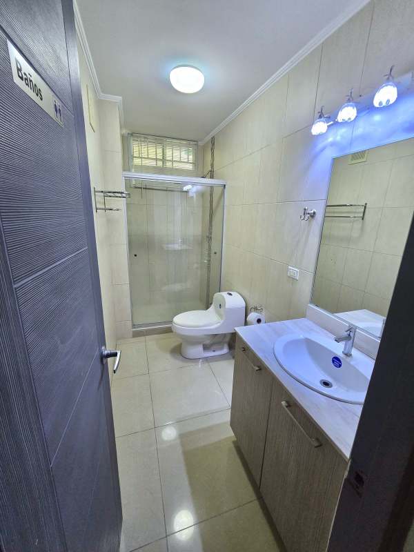 Open living and dining room with balcony and natural light PH Green Park Condado del Rey Panama