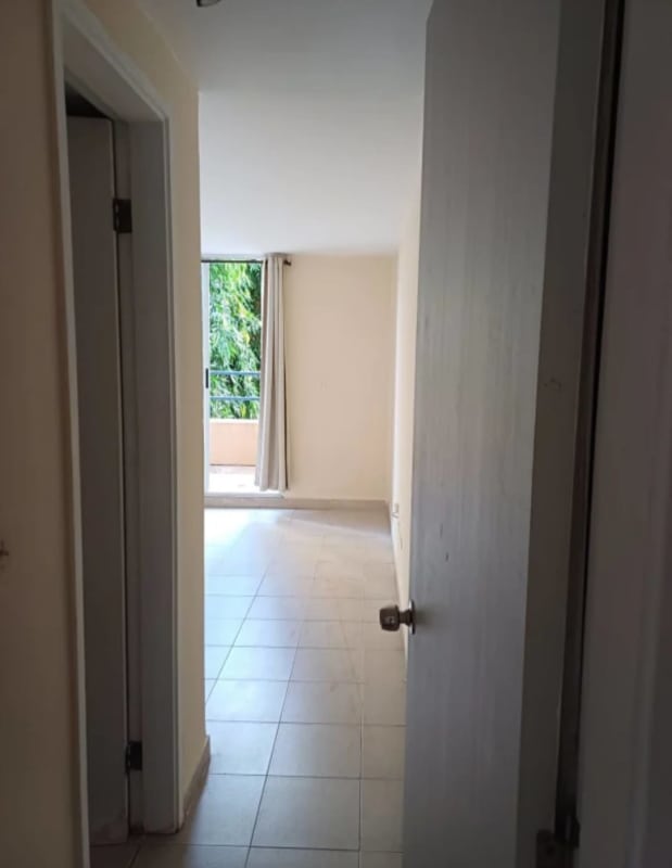Bedroom with neutral tile floor balcony access in apartment San Francisco Plaza Panama