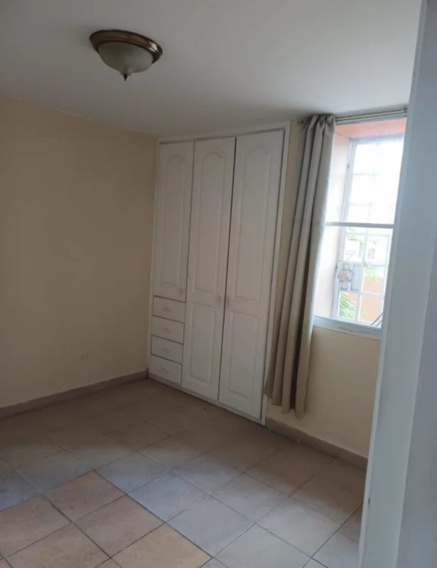 Bedroom with built-in wardrobe tiled floor apartment rental Panama City San Francisco Plaza