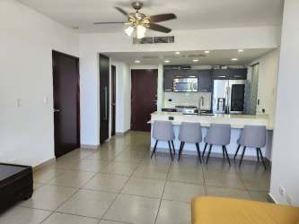 Open concept kitchen with quartz countertops Mosaic Panama Pacifico