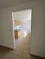 Kitchen with wood cabinets, granite countertop, tile backsplash in house for sale Costa Verde Panama West