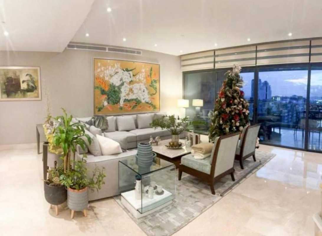 Elegant dining room with terrace access and golf course views in The Crescent Santa María Panama