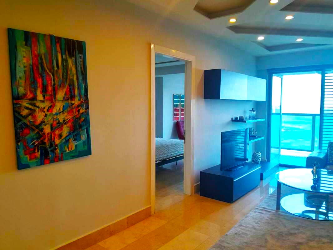 Night cityscape and rooftop pool lounge PH YOO Avenida Balboa Panama