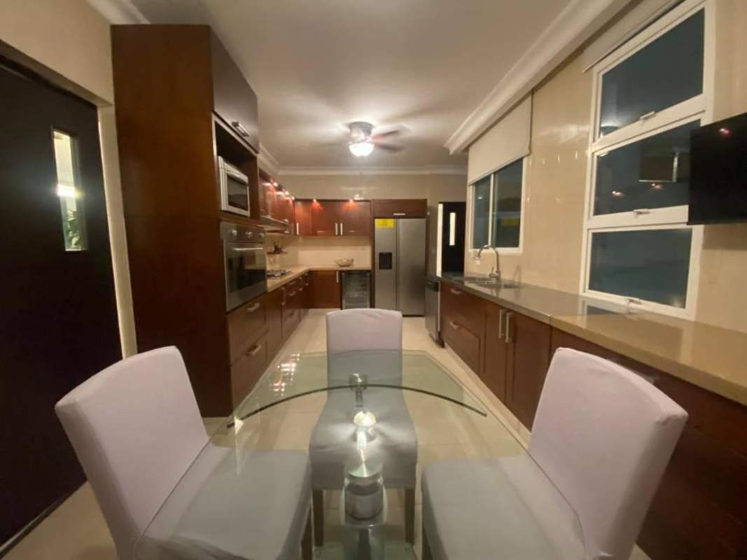 Spacious kitchen with appliances marble floor PH Sunrise Tower Panama City rental