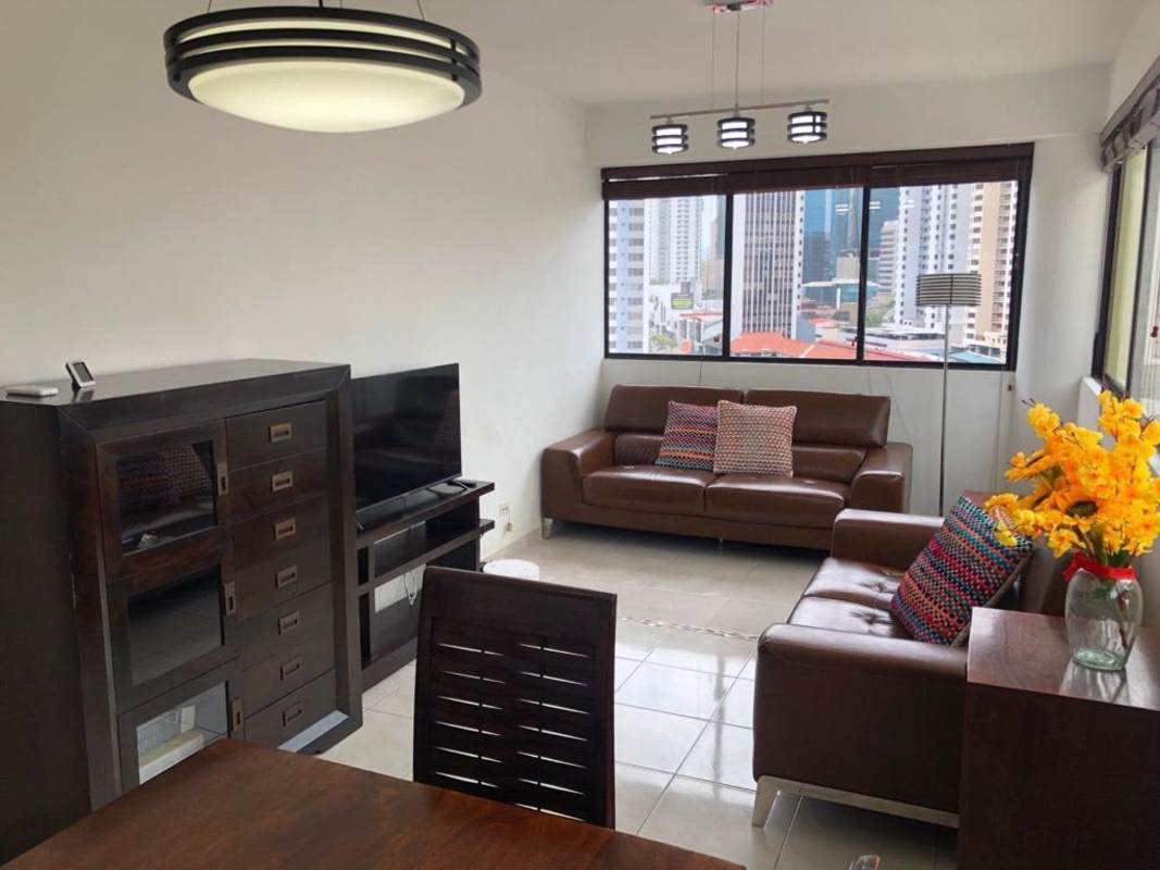 Modern bathroom with glass shower, tile finishes and vanity in Marbella furnished apartment Panama City